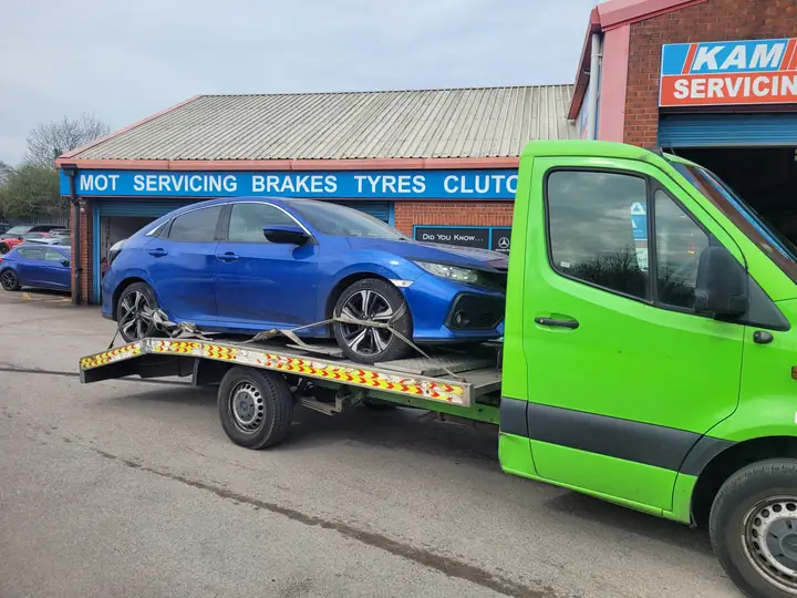 Honda Civic dropped at an MOT garage